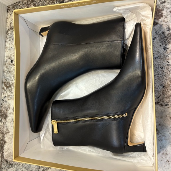 Michael Kors Black and Gold Ankle Booties with Sleek Design - Picture 1 of 2